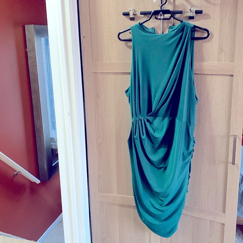 Beautiful dark green dress.
